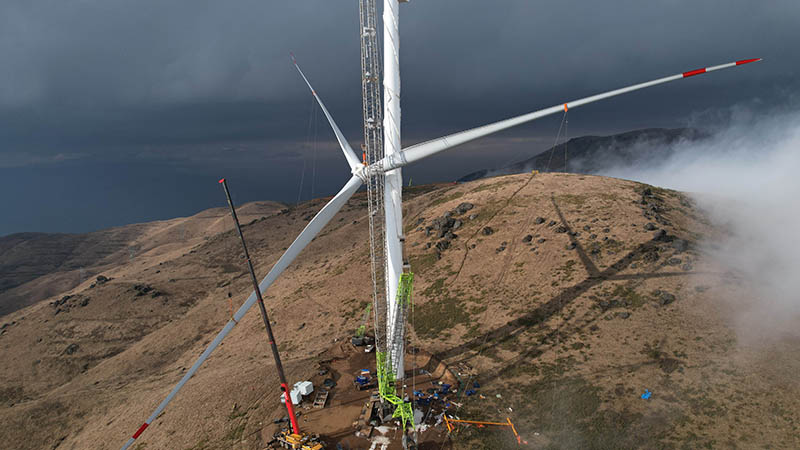 風馳電掣綠電生——寫在云南巨龍梁風電項目全容量并網發電之際